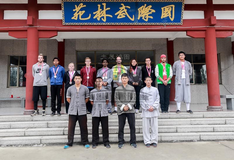 Group picture with shaolin master with earned medals