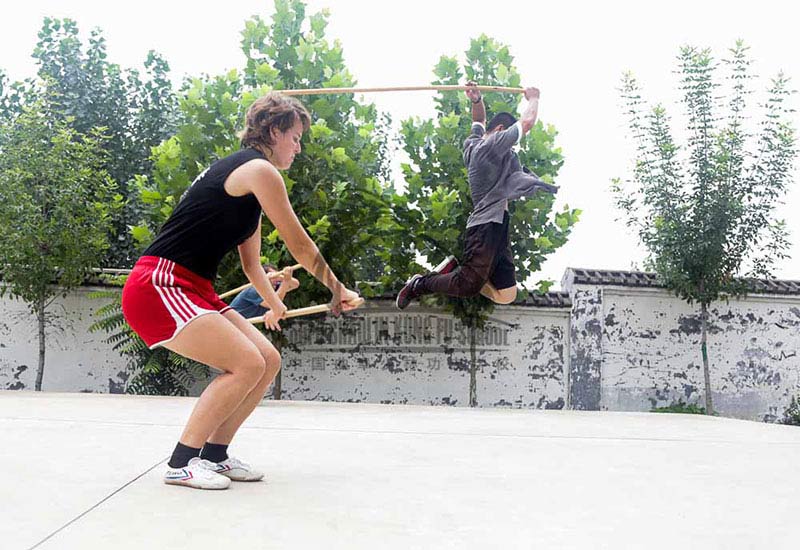 Warrior Monk Teaching Shaolin Kung Fu Staf