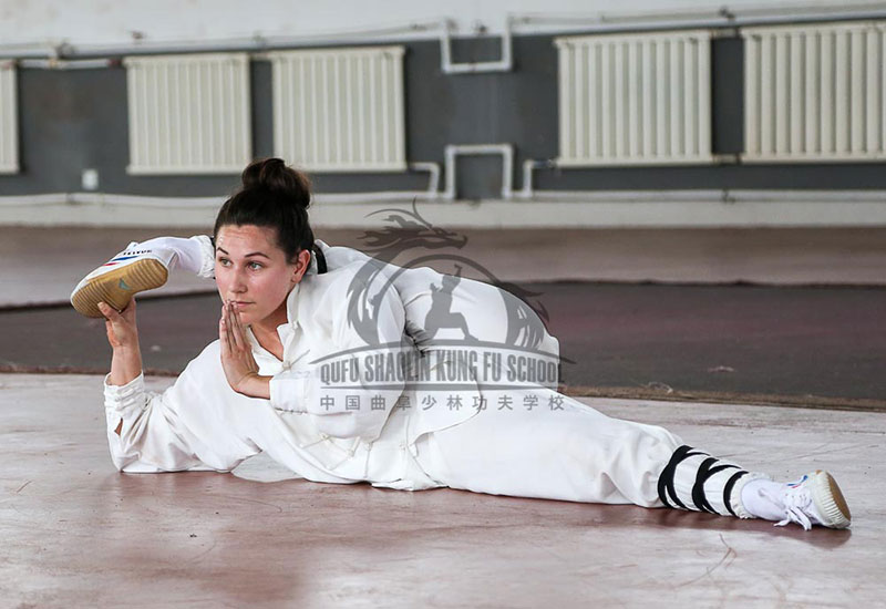girl stretching kung fu school