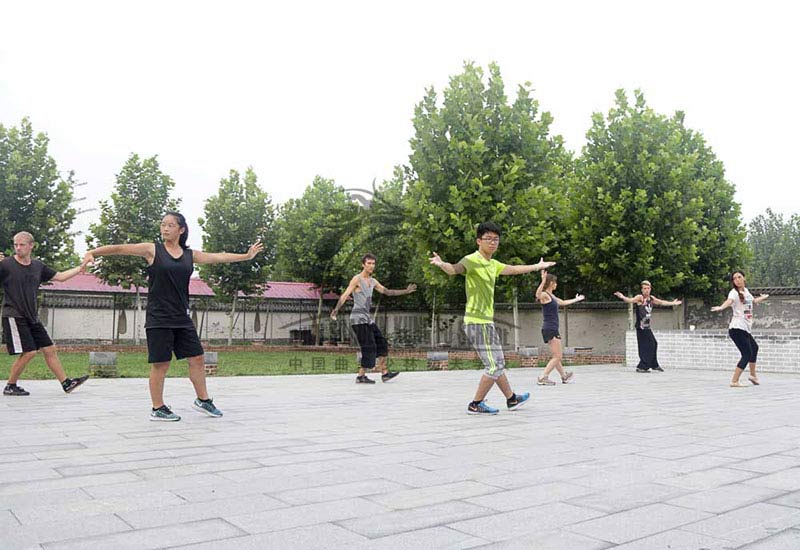 group of students practicing Tai Chi